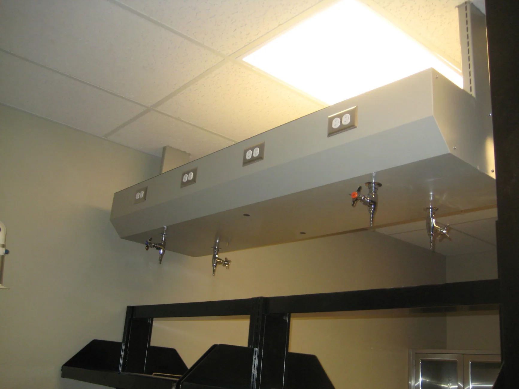 Overhead Service Carriers laboratory furniture installation by Lab Setup America